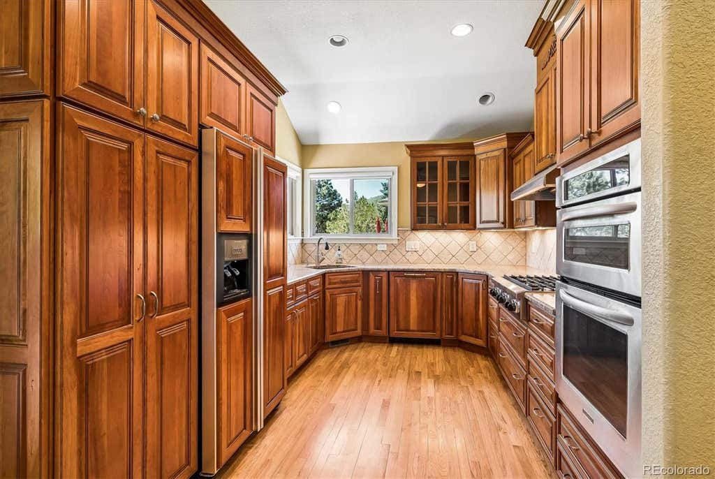 Photo of 22 Pinyon Pine Road, Littleton, CO 80127 (MLS # 7761270)