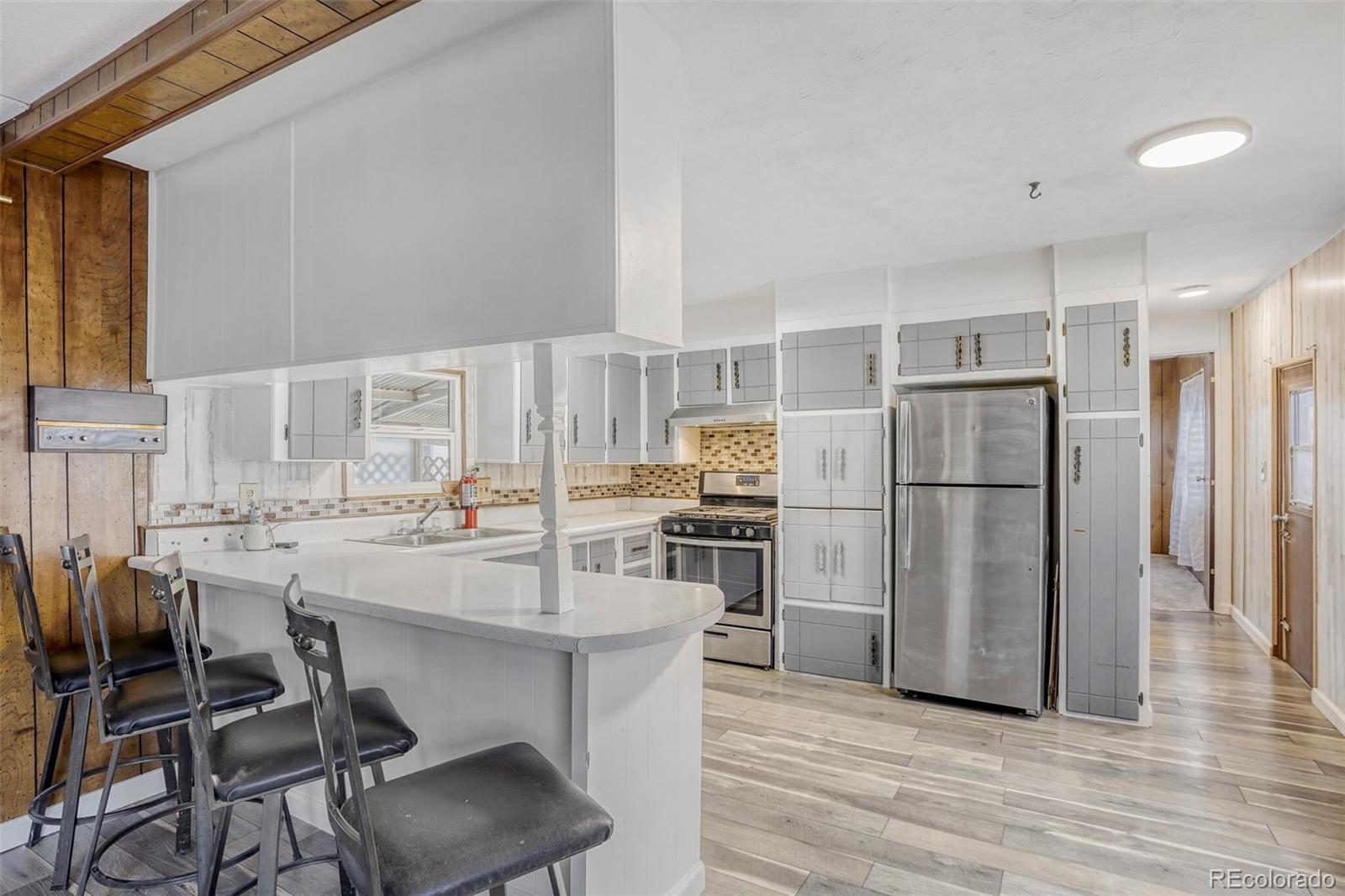 6825 W Mississippi Ave