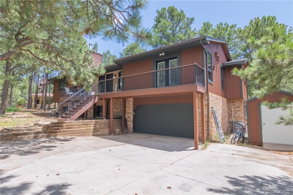 Photo of 115 E Kings Deer Point, Monument, CO 80132 (MLS # 2605640)