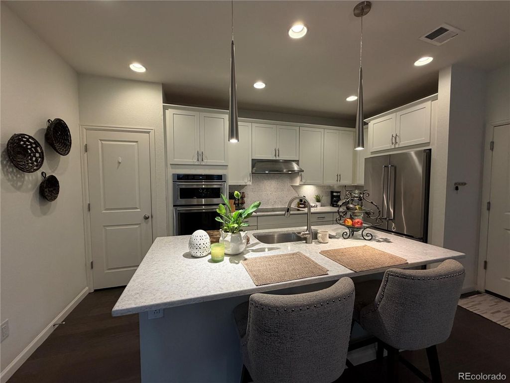 Photo of 15300 W 69th Circle #A, Arvada, CO 80007 (MLS # 4024038)