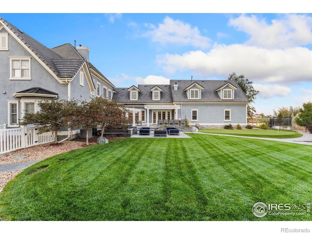 Photo of 9904 Harbor Drive, Longmont, CO 80504 (MLS # IR1047075)