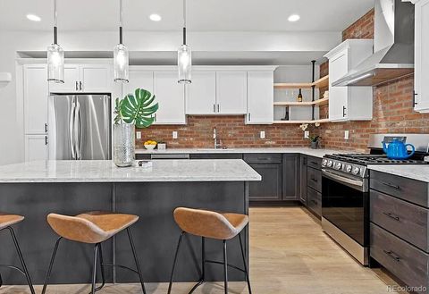 Photo of 5423 S Prince Street #E, Littleton, CO 80120 (MLS # 9050832)