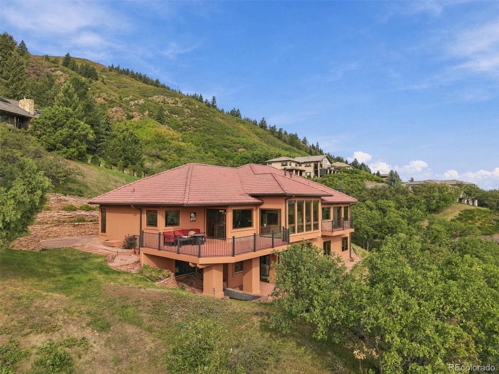 Photo of 10562 Sandstone Run, Littleton, CO 80125 (MLS # 6233375)