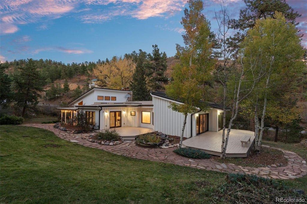 Photo of 9037 S Deer Creek Canyon Road, Littleton, CO 80127 (MLS # 7533550)