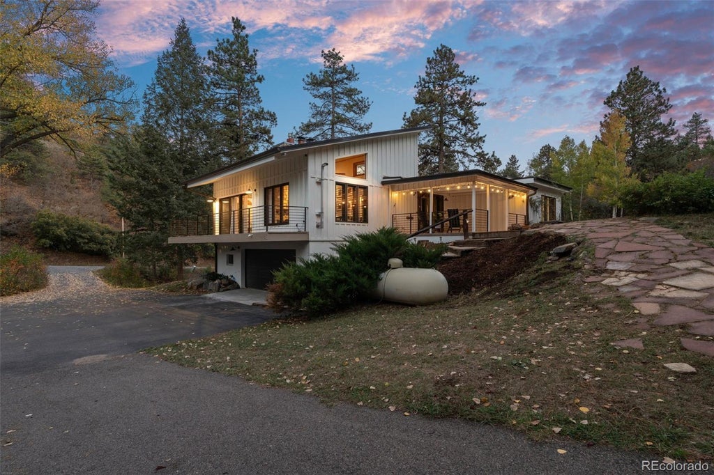 Photo of 9037 S Deer Creek Canyon Road, Littleton, CO 80127 (MLS # 7533550)