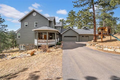 Photo of 26400 Columbine Glen Avenue, Golden, CO 80401 (MLS # 1755396)