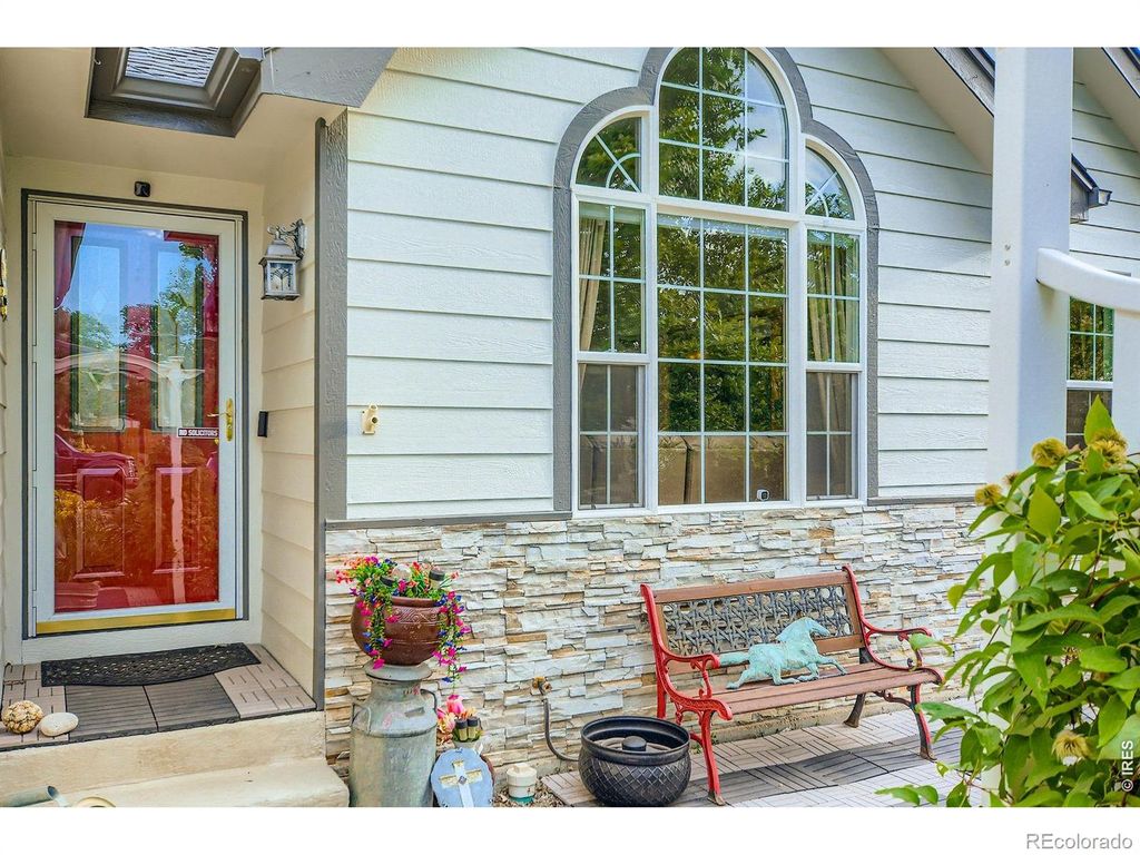 Photo of 1121 Country Acres Court, Johnstown, CO 80534 (MLS # IR1053445)