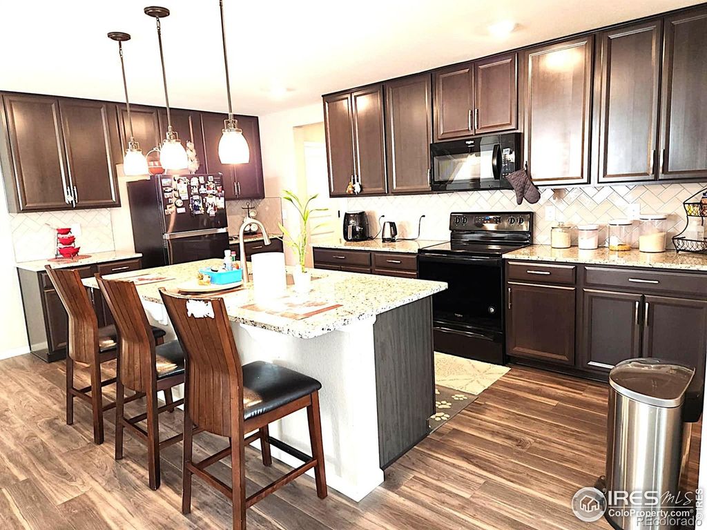 Photo of 1982 Griffin Drive, Brighton, CO 80601 (MLS # IR1041348)