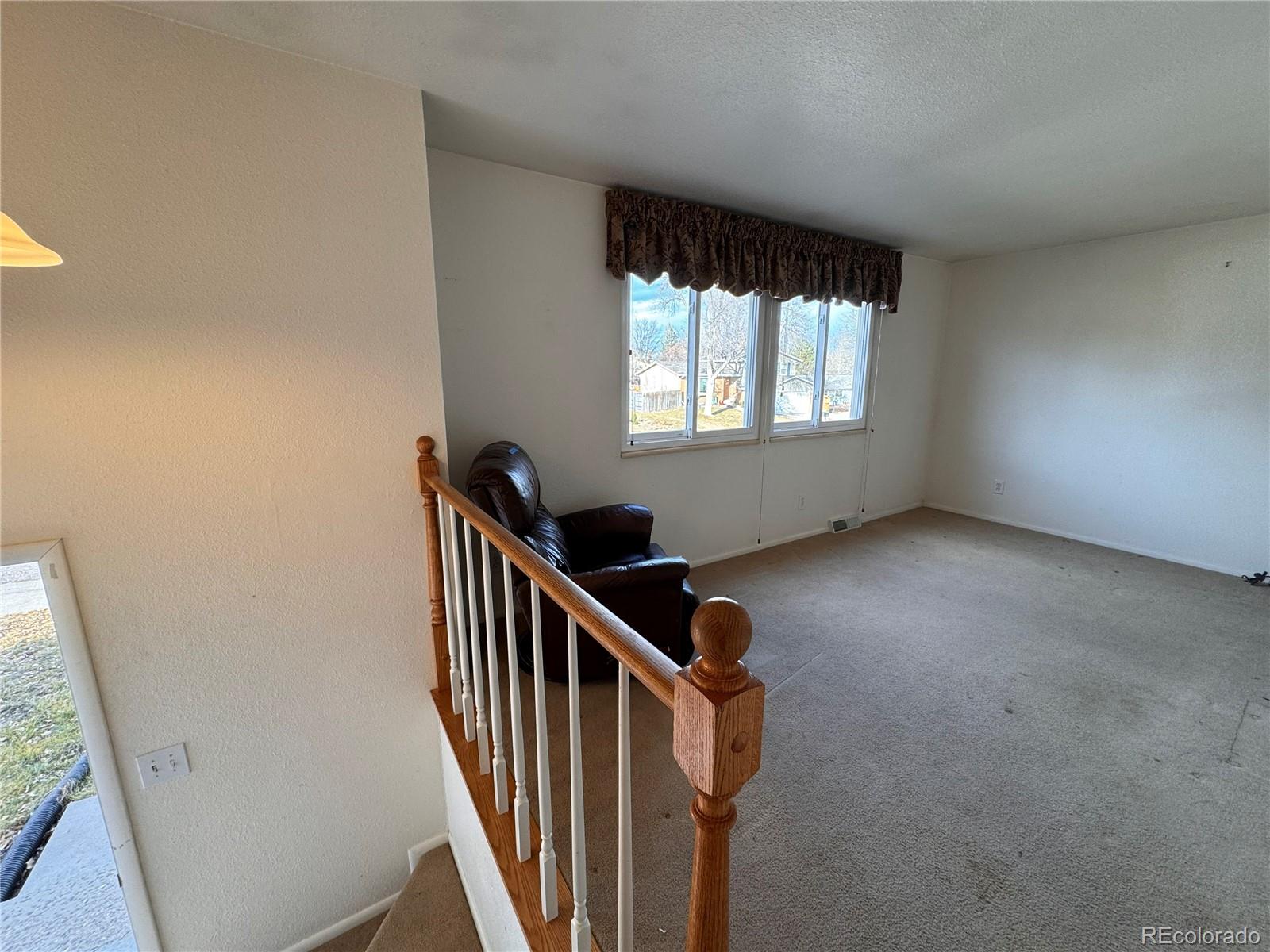 7034 W Roxbury Place