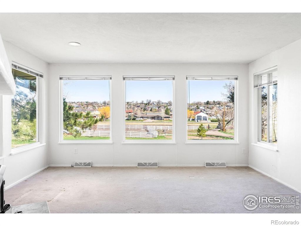 Photo of 12940 W 75th Avenue, Arvada, CO 80005 (MLS # IR1044844)