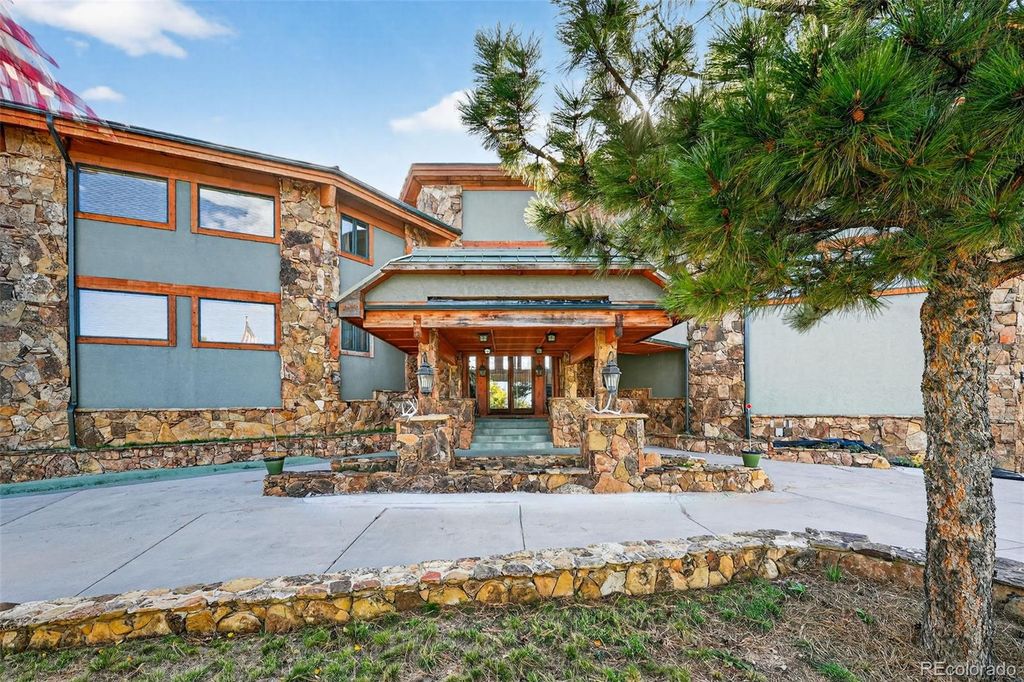 Photo of 14900 Elk Mountain Trail, Littleton, CO 80127 (MLS # 2429972)