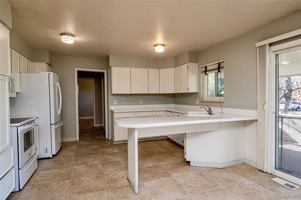 Photo of 13105 E 5th Avenue, Aurora, CO 80111 (MLS # 8865067)