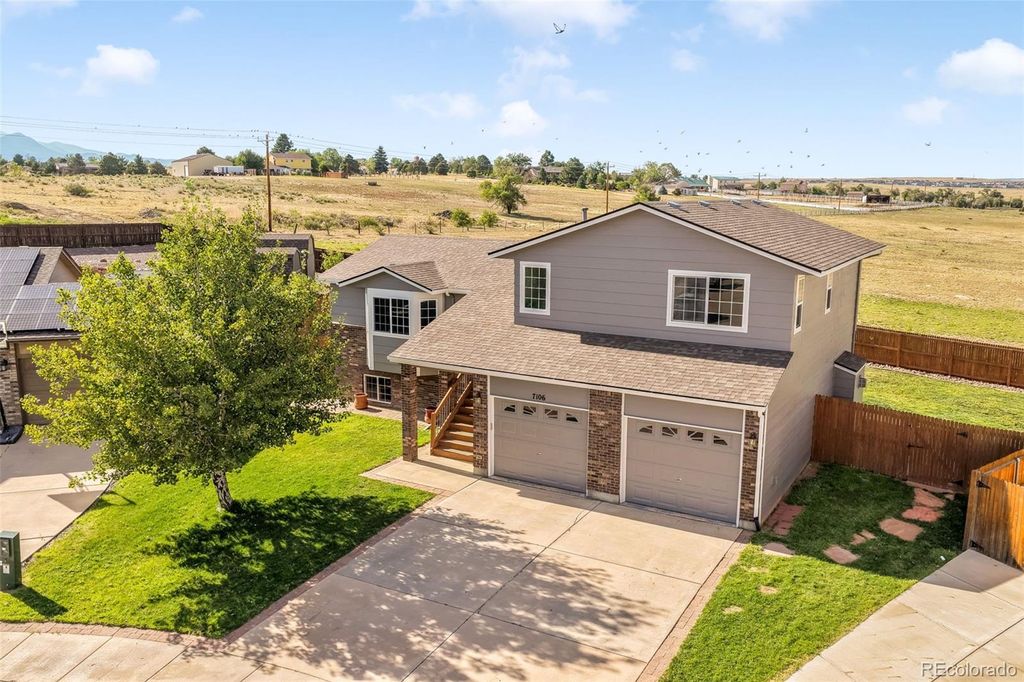 Photo of 7106 Lone Eagle Lane, Colorado Springs, CO 80925 (MLS # 7372902)