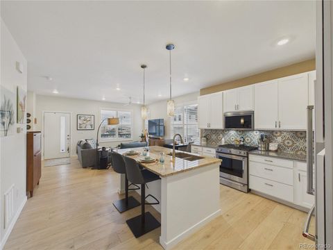 Photo of 14553 W 91st Drive #A, Arvada, CO 80005 (MLS # 3882531)