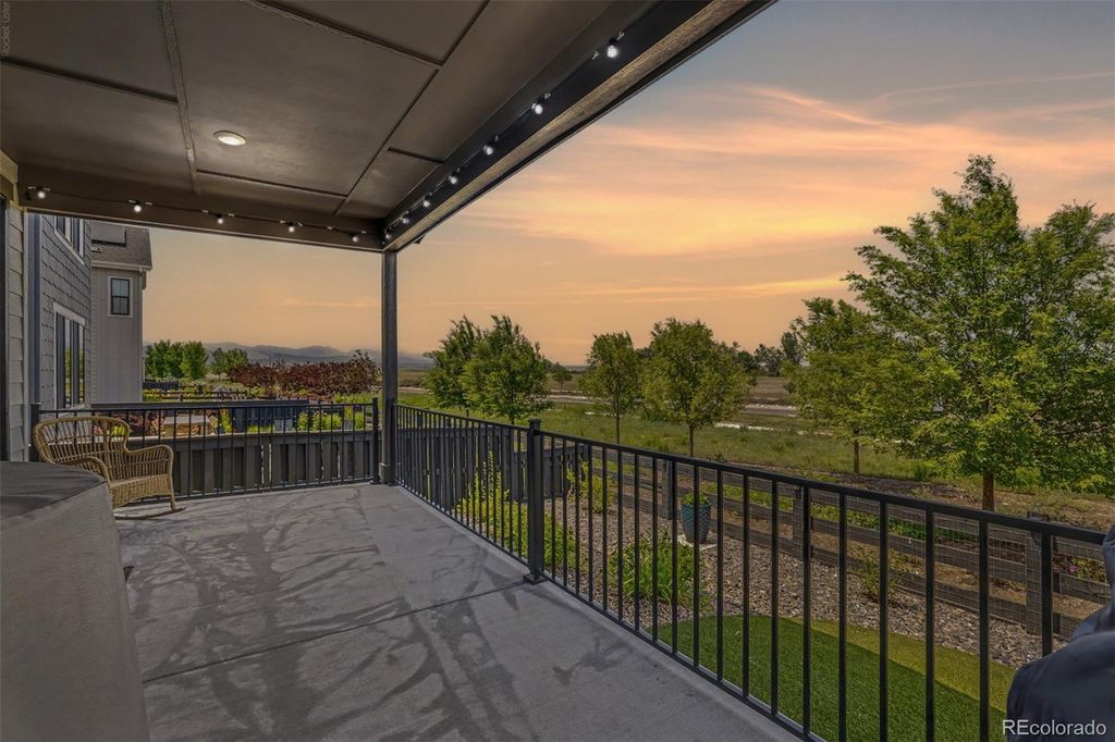 Photo of 8765 Moonshimmer Trail, Littleton, CO 80125 (MLS # 9608248)