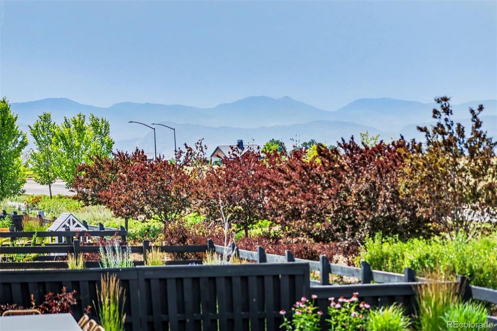Photo of 8765 Moonshimmer Trail, Littleton, CO 80125 (MLS # 9608248)