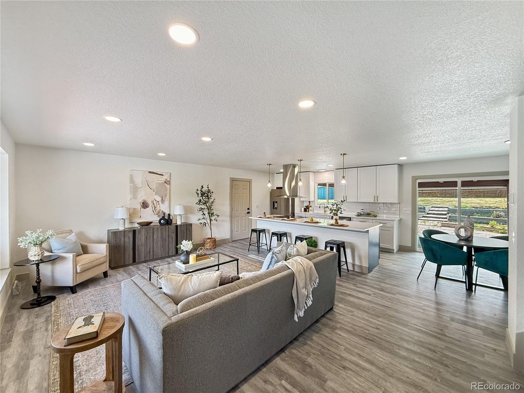 Photo of 11310 W Center Ave Ave, Lakewood, CO 80226 (MLS # 7003413)