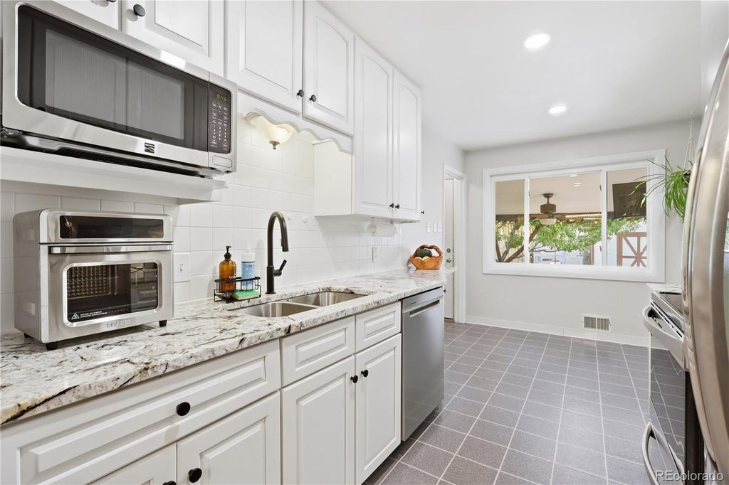 Photo of 1990 S Stuart Street, Denver, CO 80219 (MLS # 5711627)