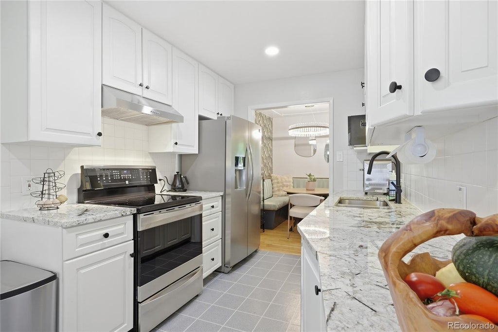 Photo of 1990 S Stuart Street, Denver, CO 80219 (MLS # 5711627)