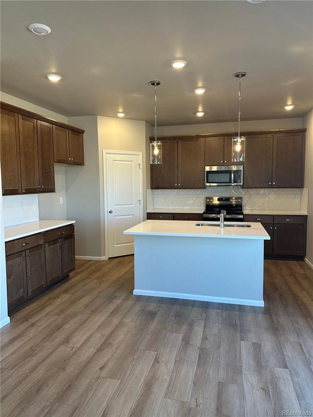 Photo of 15348 Poplar Street, Thornton, CO 80602 (MLS # 2150245)