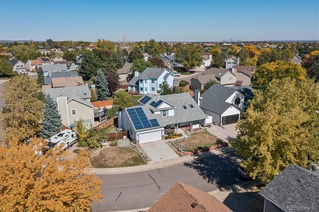Photo of 11997 W Aqueduct Drive, Littleton, CO 80127 (MLS # 7094399)