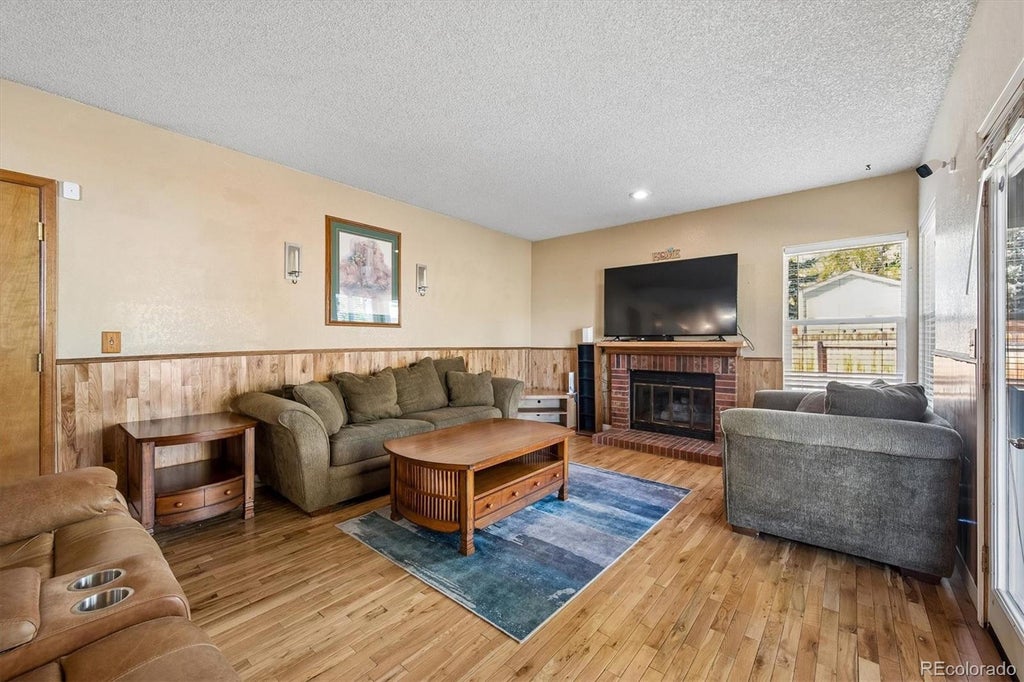 Photo of 11997 W Aqueduct Drive, Littleton, CO 80127 (MLS # 7094399)