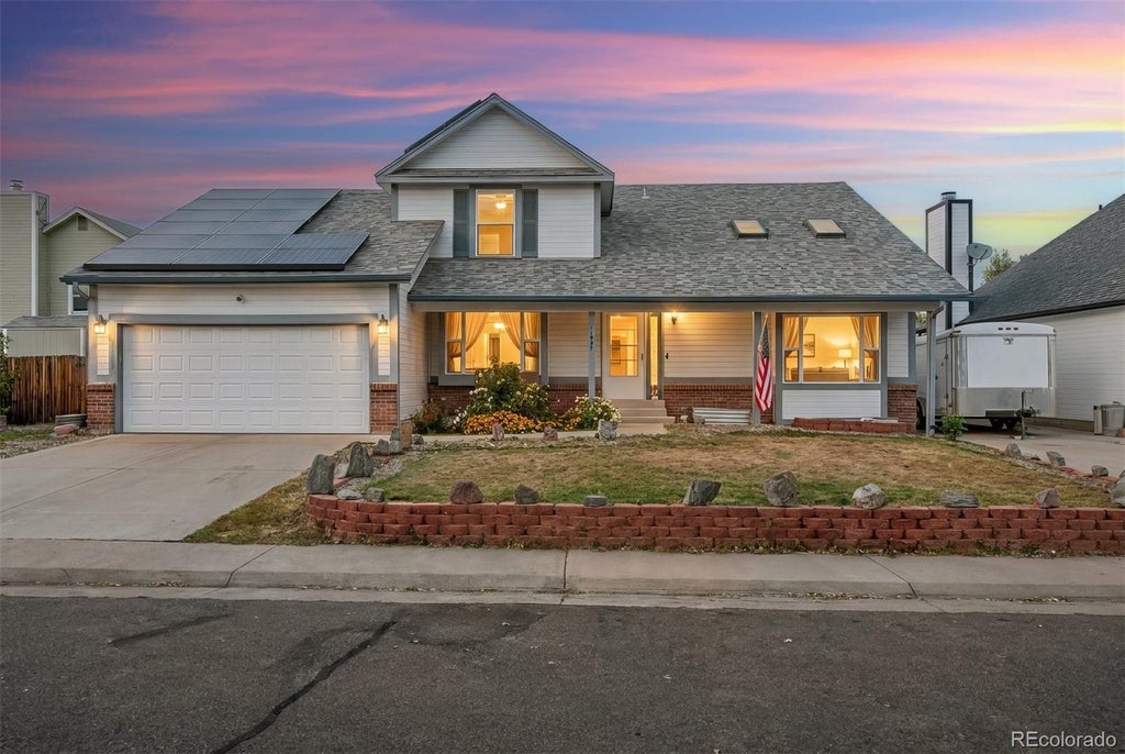 Photo of 11997 W Aqueduct Drive, Littleton, CO 80127 (MLS # 7094399)