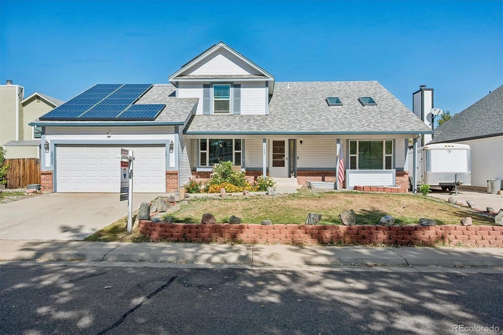 Photo of 11997 W Aqueduct Drive, Littleton, CO 80127 (MLS # 7094399)