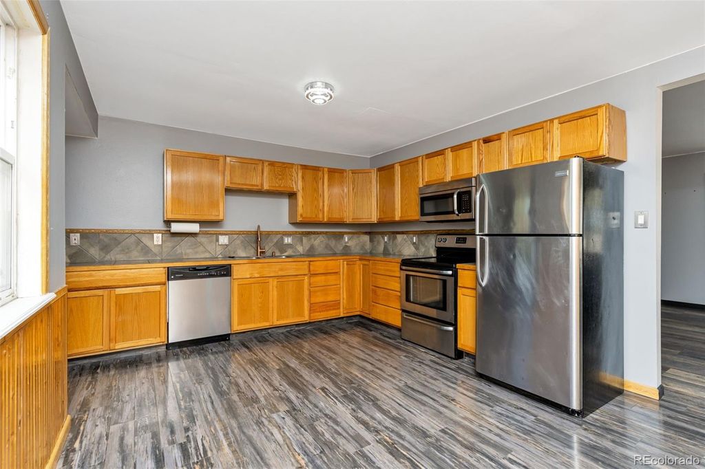 Photo of 1781 Rowena. Street, Thornton, CO 80229 (MLS # 9460721)