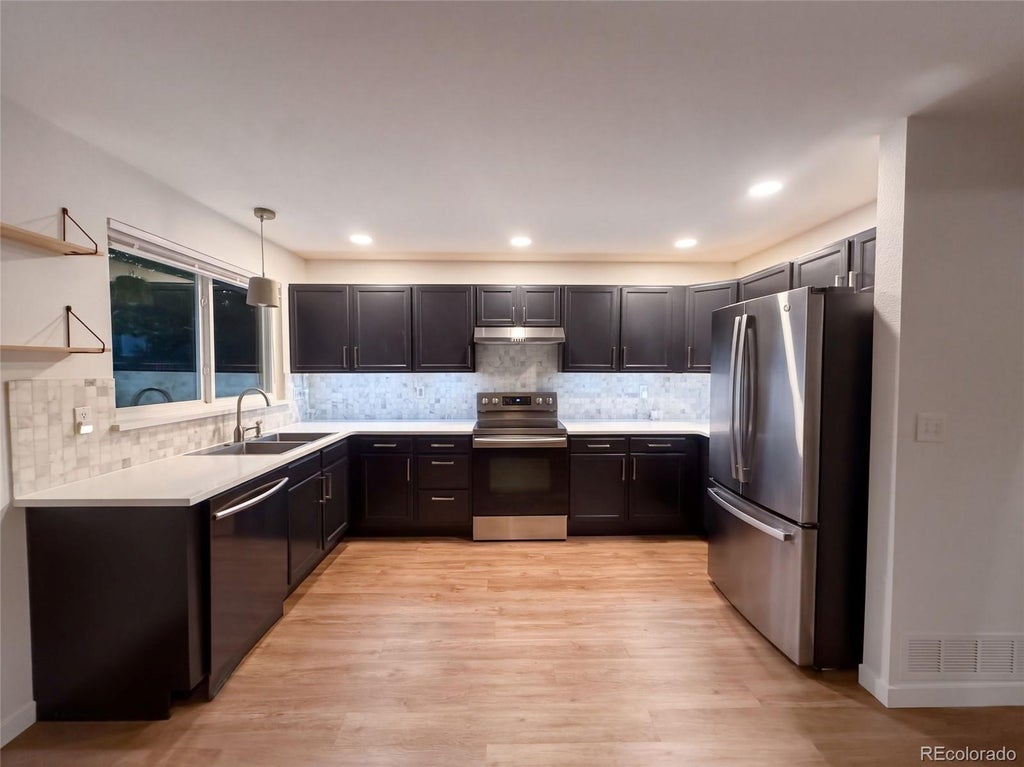 Photo of 5549 S Youngfield Way, Littleton, CO 80127 (MLS # 6166943)