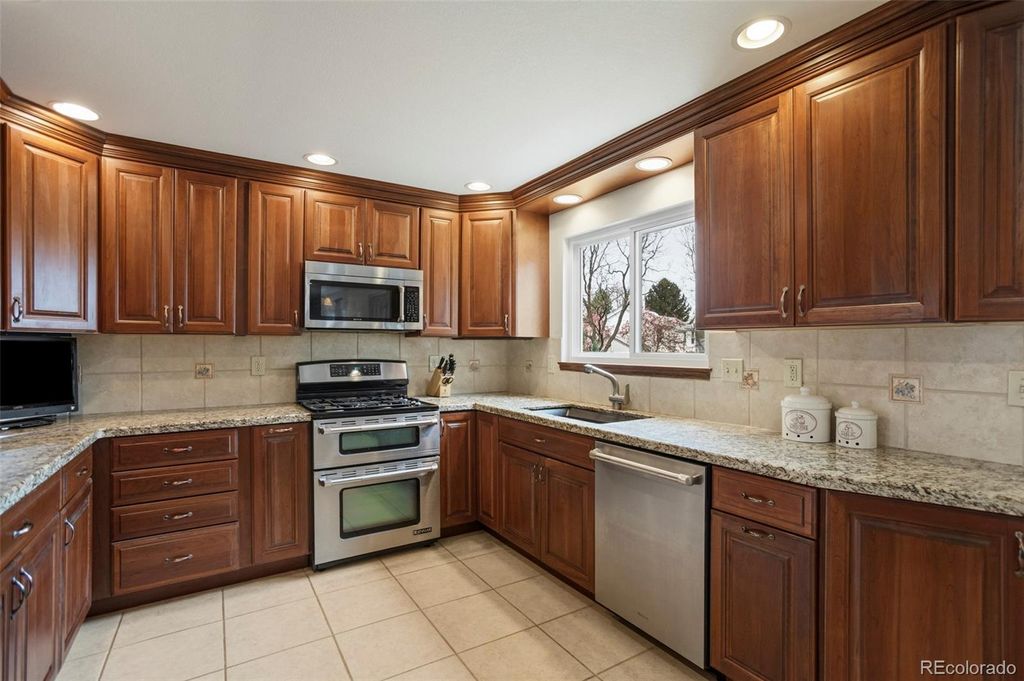 Photo of 4713 S Fraser Street, Aurora, CO 80015 (MLS # 8089687)