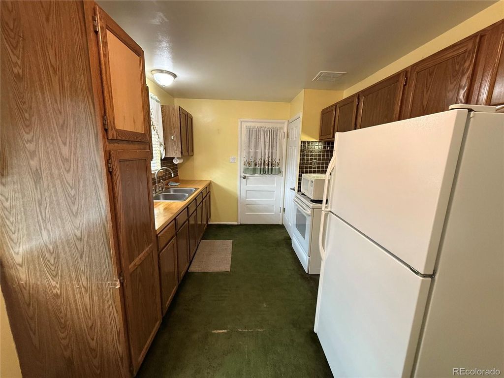 Photo of 5855 S Delaware Street, Littleton, CO 80120 (MLS # 3655959)