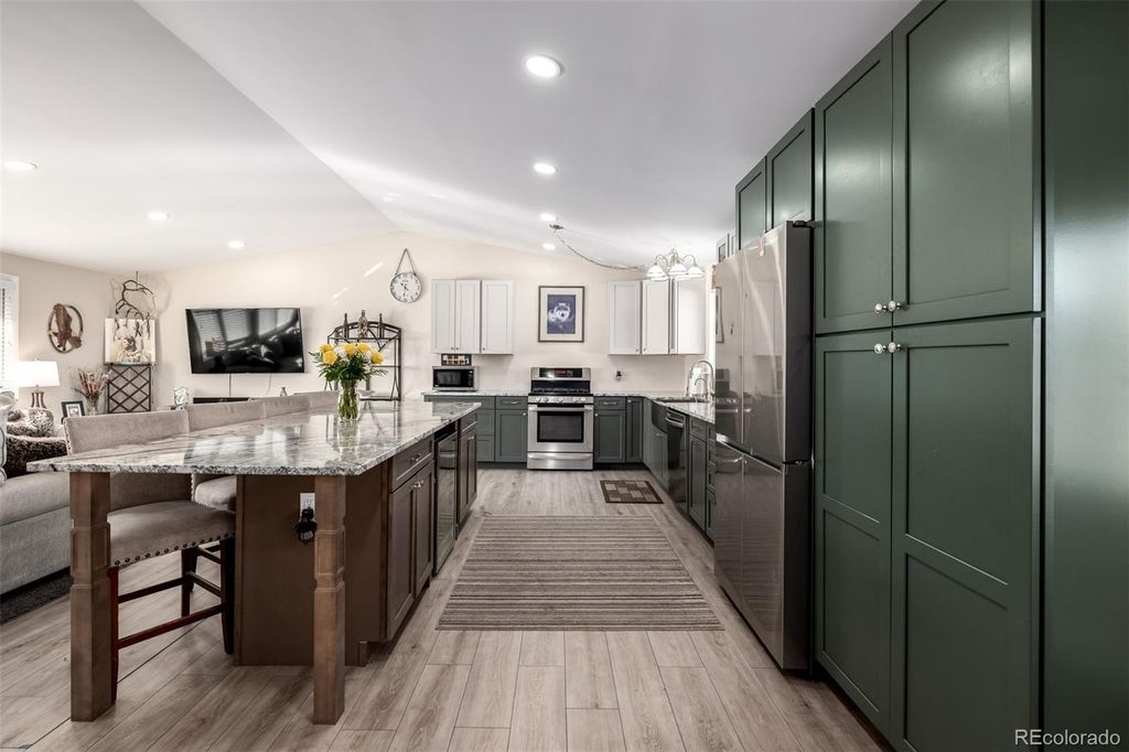 Photo of 6611 W 74th Avenue, Arvada, CO 80003 (MLS # 3947274)