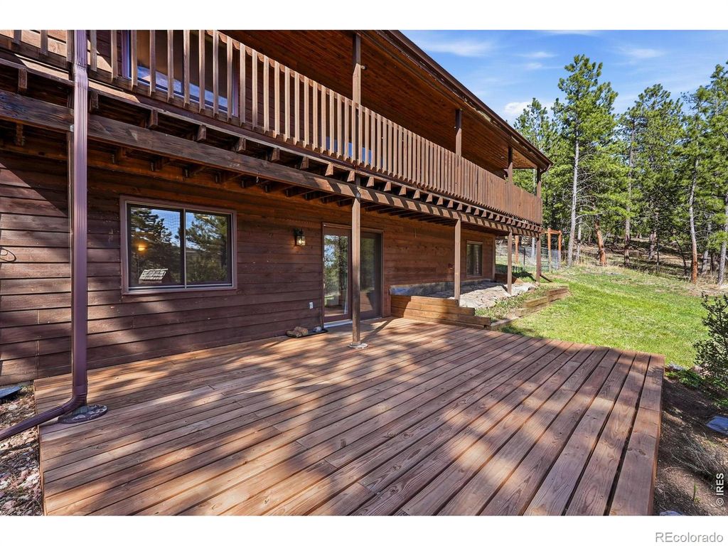 Photo of 560 Quillan Gulch Road, Loveland, CO 80537 (MLS # IR1059214)