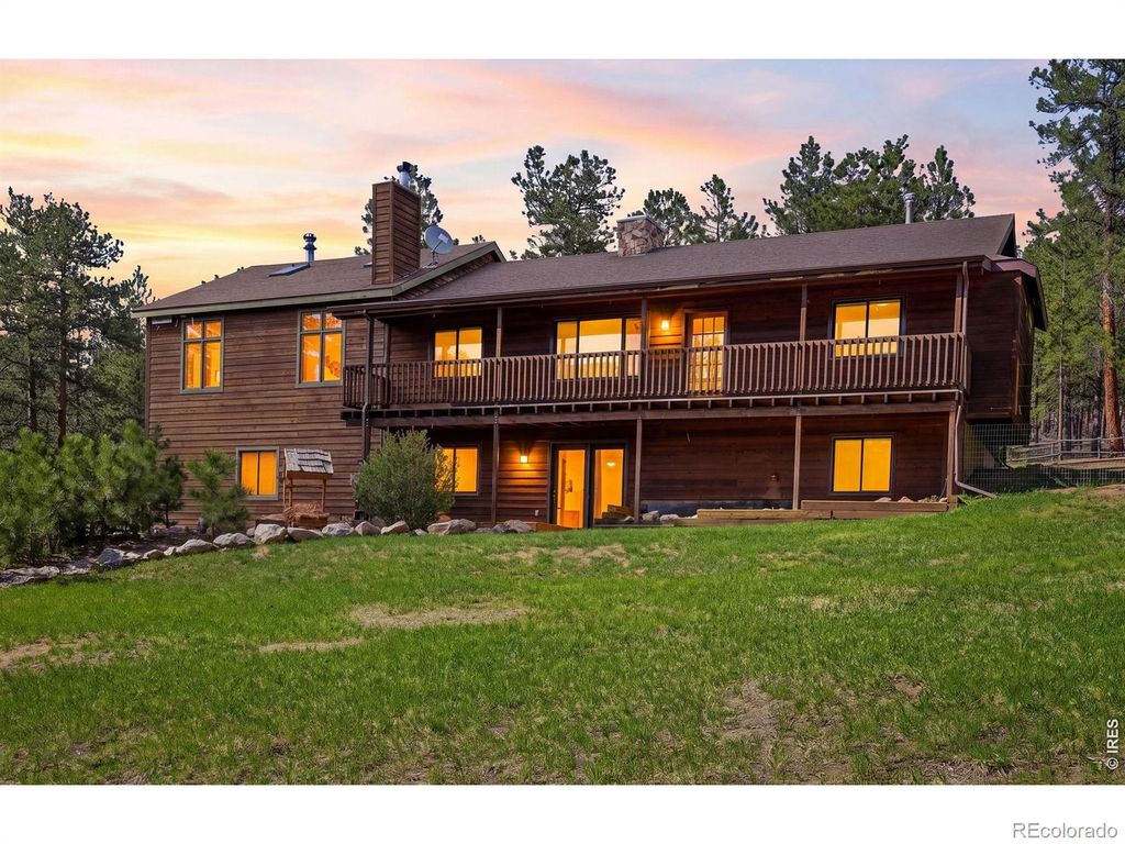 Photo of 560 Quillan Gulch Road, Loveland, CO 80537 (MLS # IR1059214)