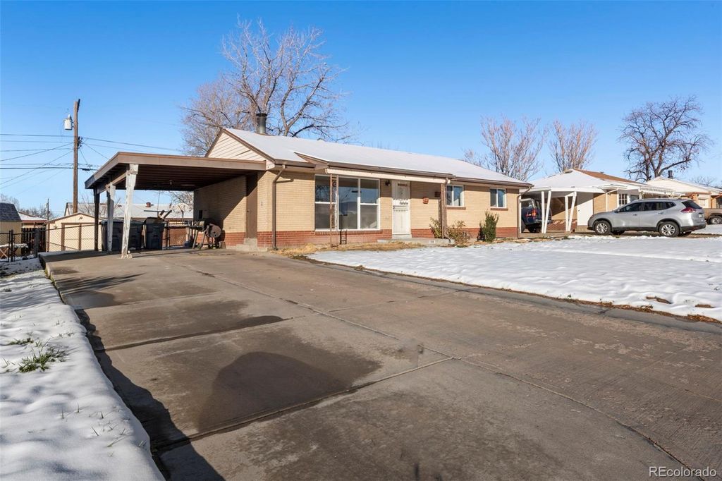 Photo of 5681 Demott Avenue, Commerce City, CO 80022 (MLS # 5587063)