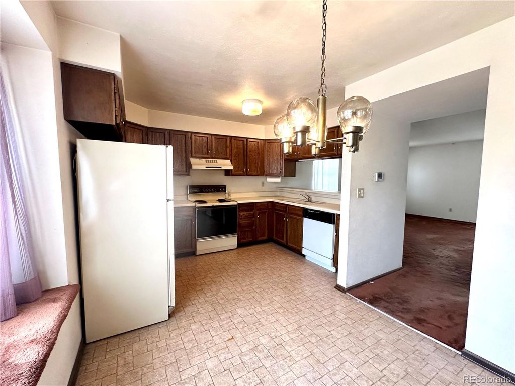 Photo of 12124 W Vail Pass, Littleton, CO 80127 (MLS # 7571375)