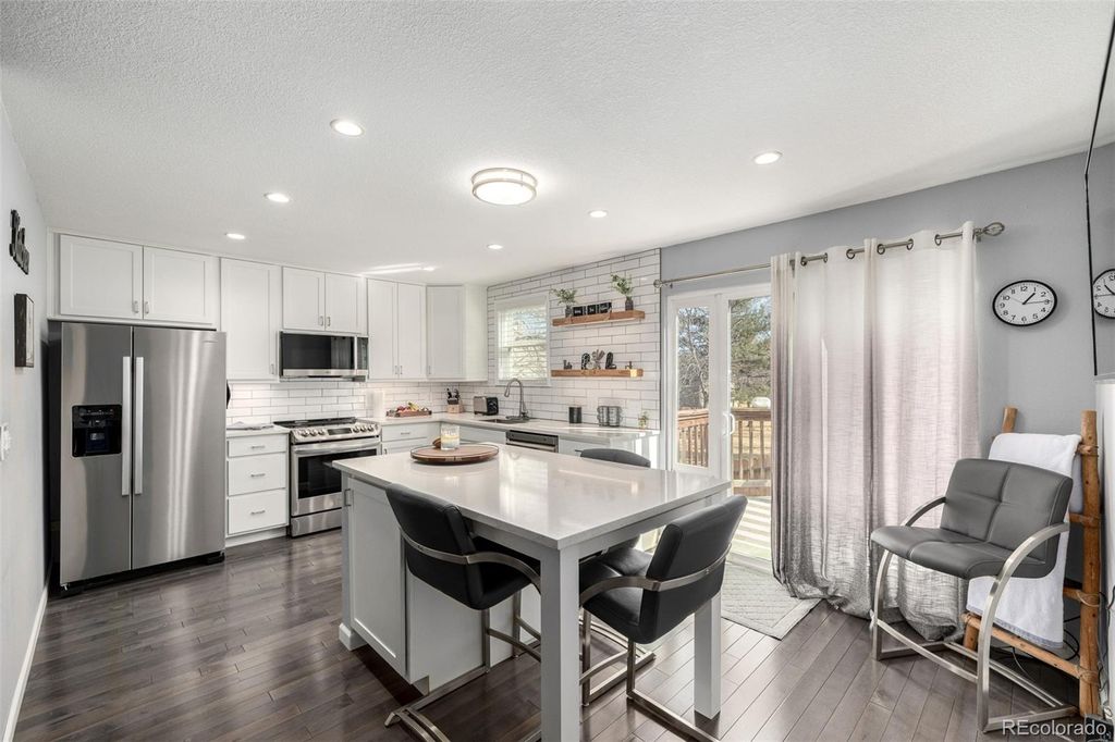 Photo of 639 W Jamison Circle, Littleton, CO 80120 (MLS # 9800081)