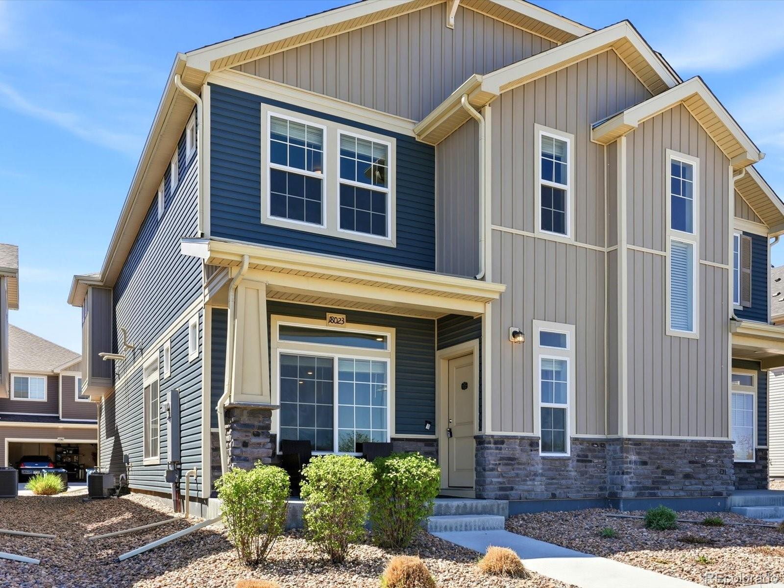Welcome to 18023 E 103rd! This beautiful half duplex features a cozy front porch and is awaiting its new owner!