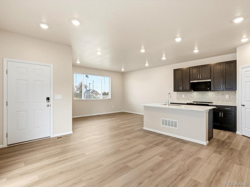 Photo of 2223 E 164th Avenue, Thornton, CO 80602 (MLS # 7565897)