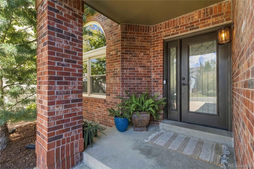 Photo of 24 Mesa Oak, Littleton, CO 80127 (MLS # 1787316)