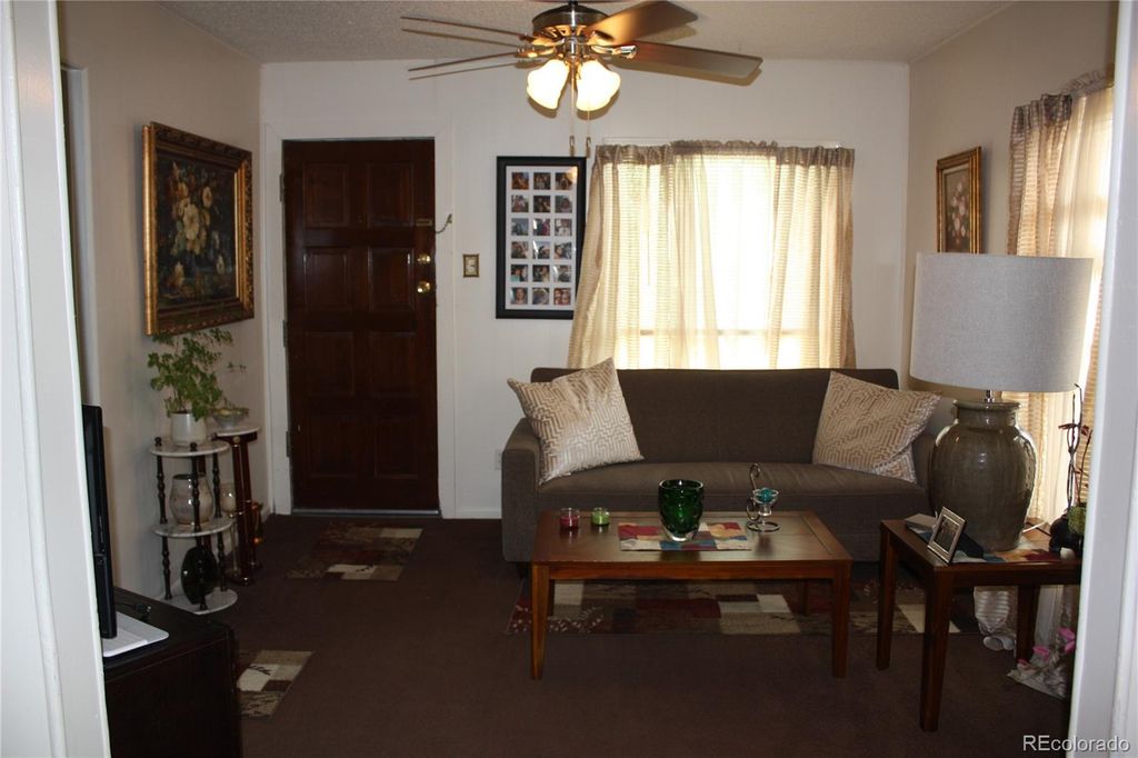 Photo of 5095 Grant Street, Denver, CO 80216 (MLS # 2297815)