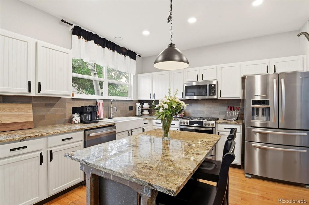 Photo of 9177 W Rockland Place, Littleton, CO 80128 (MLS # 9886163)