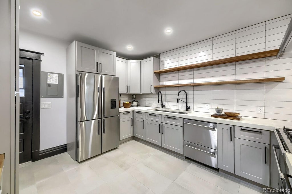 Photo of 5699 W 10th Avenue, Lakewood, CO 80214 (MLS # 7461953)