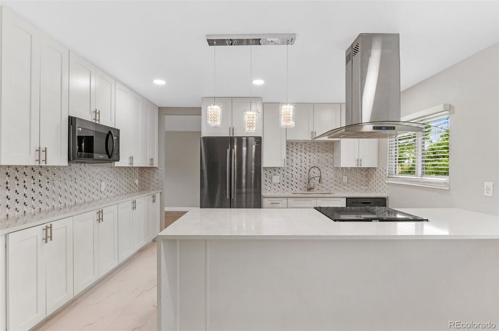 Photo of 12992 W Jewell Circle, Lakewood, CO 80228 (MLS # 6121228)