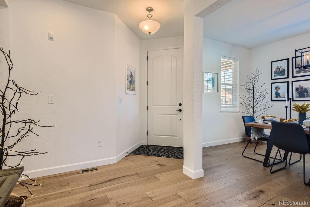 Photo of 8137 Ralston Creek Avenue, Littleton, CO 80125 (MLS # 7880935)