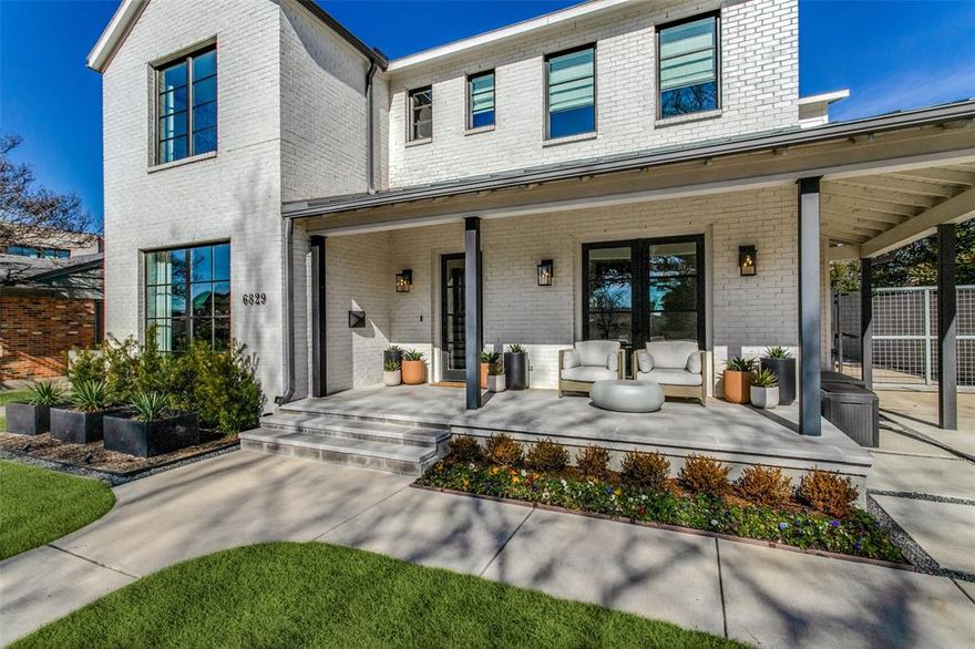 This Lakewood Elementary jewel box is a stunning blend of thoughtful, high end design & modern luxury. Downstairs boasts ample space to entertain, with a formal dining room opening to the living & kitchen spaces.  The kitchen is complete with stainless steel appliances, quartz countertops, oversized island & adjacent bar. It overlooks the living room with fireplace and built in cabinets. Also downstairs is a bedroom with ensuite bath that can double as a study study. Upstairs are 4 bedrooms, including the primary bedroom with spa-like ensuite bath and a generous-sized family room. Other features include gorgeous wood floors, decorative lighting, wallpaper & more. Doors from the living room open to an outdoor living space with covered patio & built in grill, outdoor basketball court & sparkling pool and spa. The detached two car garage can be accessed through the driveway or the alley. Situated on a family-friendly, desirable street in Lakewood & walking distance to White Rock Lake!