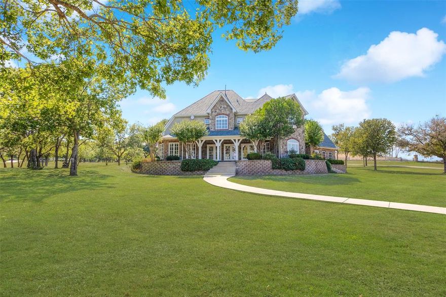 This elegant Cape Cod style estate beckons Martha Stewart style throughout & is on 5.75 acres in a private gated community. The living room is accented by a traditional fireplace with built-ins, French doors & wood floors. The kitchen provides a gas cooktop, granite countertops & plenty of storage. Off of the welcoming entry, you will find flexible spaces for a study or library, office or formal dining. The expansive downstairs master suite is accented by vaulted ceilings & plantation shutters. 3 bedrooms are located on the second floor with two bathrooms plus an exercise room. A separate wing provides a large game room & full bath, which could also be a 5th bedroom. The home is made for entertaining with a gorgeous pool house that features a full kitchen, soaring fireplace & full bath. Large patios & outdoor kitchen flank the incredible pool & spa. EV Hookup in garage. There is also a lighted tennis court & fire pit. Once you see the property, you will never want to leave!