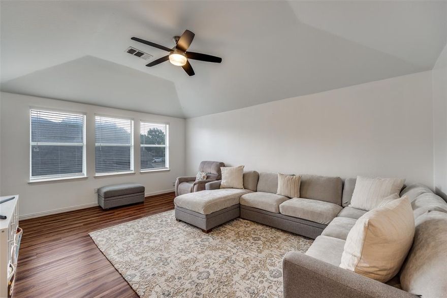 Located in the highly rated McKinney ISD and just minutes from Hwy 380, Hwy 75, shopping, dining, and entertainment, this beautifully renovated and immaculately maintained 4-bedroom, 2.5-bath home with a dedicated office is move-in ready and designed for comfortable living. Downstairs, the open floorplan features brand new premium LVP flooring with 6-inch baseboards, new recessed lighting, and an updated half bath. The kitchen is a standout with new soft-close cabinets, granite countertops, a large island with added storage, and an oversized sink. The laundry room has also been upgraded with a new sink, granite countertops, and additional cabinets and drawers to maximize organization. Upstairs, a spacious second living area is ideal for a game room, playroom, or flexible living space. The large primary suite boasts dual sinks and an oversized walk-in shower, creating a private retreat. Outside, a new sprinkler system in the front and backyard, and a covered patio provide plenty of room to relax or entertain. The garage includes ceiling racks for extra storage. With its thoughtful updates, functional layout, and unbeatable location, this move-in ready home is perfectly suited for its next chapter.