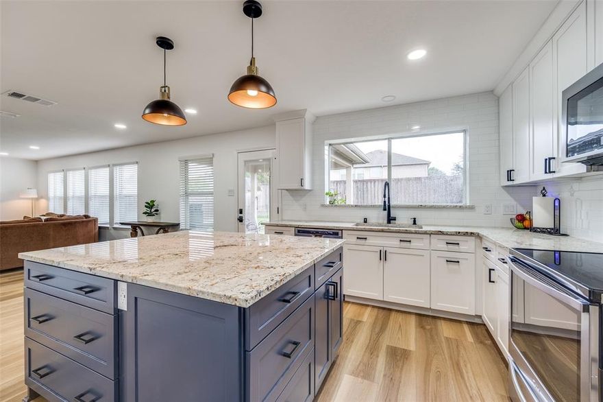 Located in the highly rated McKinney ISD and just minutes from Hwy 380, Hwy 75, shopping, dining, and entertainment, this beautifully renovated and immaculately maintained 4-bedroom, 2.5-bath home with a dedicated office is move-in ready and designed for comfortable living. Downstairs, the open floorplan features brand new premium LVP flooring with 6-inch baseboards, new recessed lighting, and an updated half bath. The kitchen is a standout with new soft-close cabinets, granite countertops, a large island with added storage, and an oversized sink. The laundry room has also been upgraded with a new sink, granite countertops, and additional cabinets and drawers to maximize organization. Upstairs, a spacious second living area is ideal for a game room, playroom, or flexible living space. The large primary suite boasts dual sinks and an oversized walk-in shower, creating a private retreat. Outside, a new sprinkler system in the front and backyard, and a covered patio provide plenty of room to relax or entertain. The garage includes ceiling racks for extra storage. With its thoughtful updates, functional layout, and unbeatable location, this move-in ready home is perfectly suited for its next chapter.